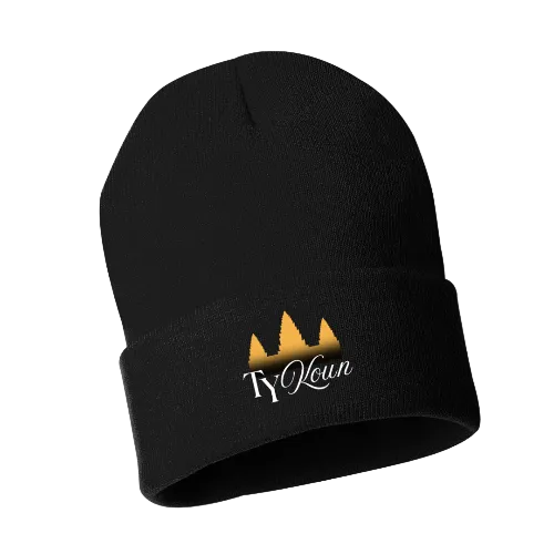 Black beanie with gold and white logo on a white background